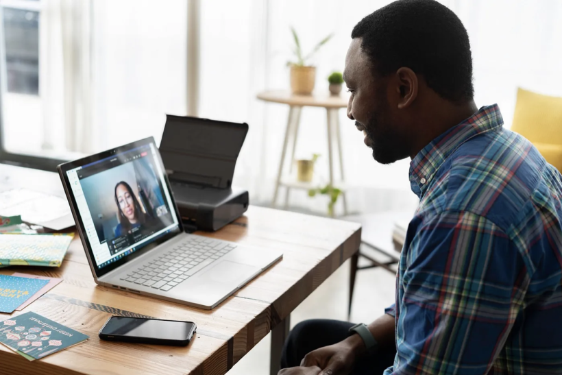 a man is interviewing for a job via videocall